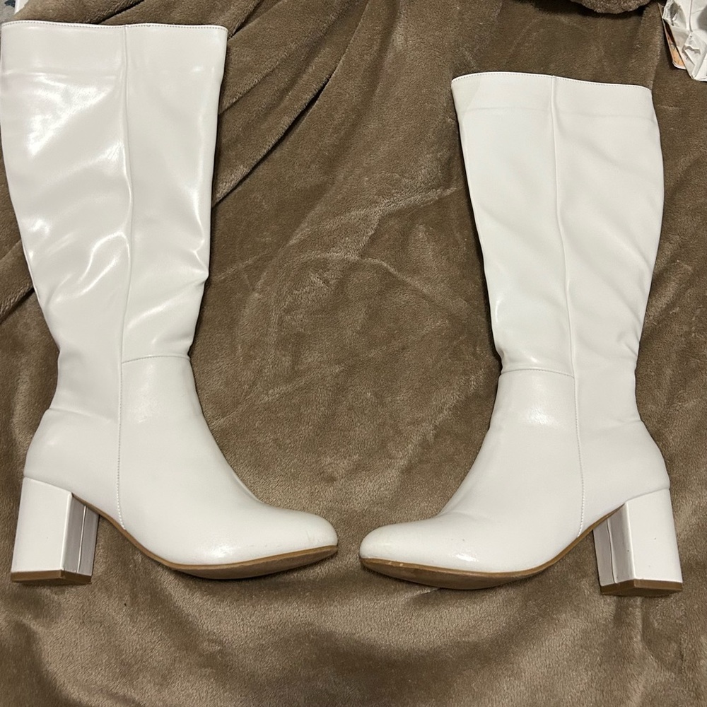 White knee high boots